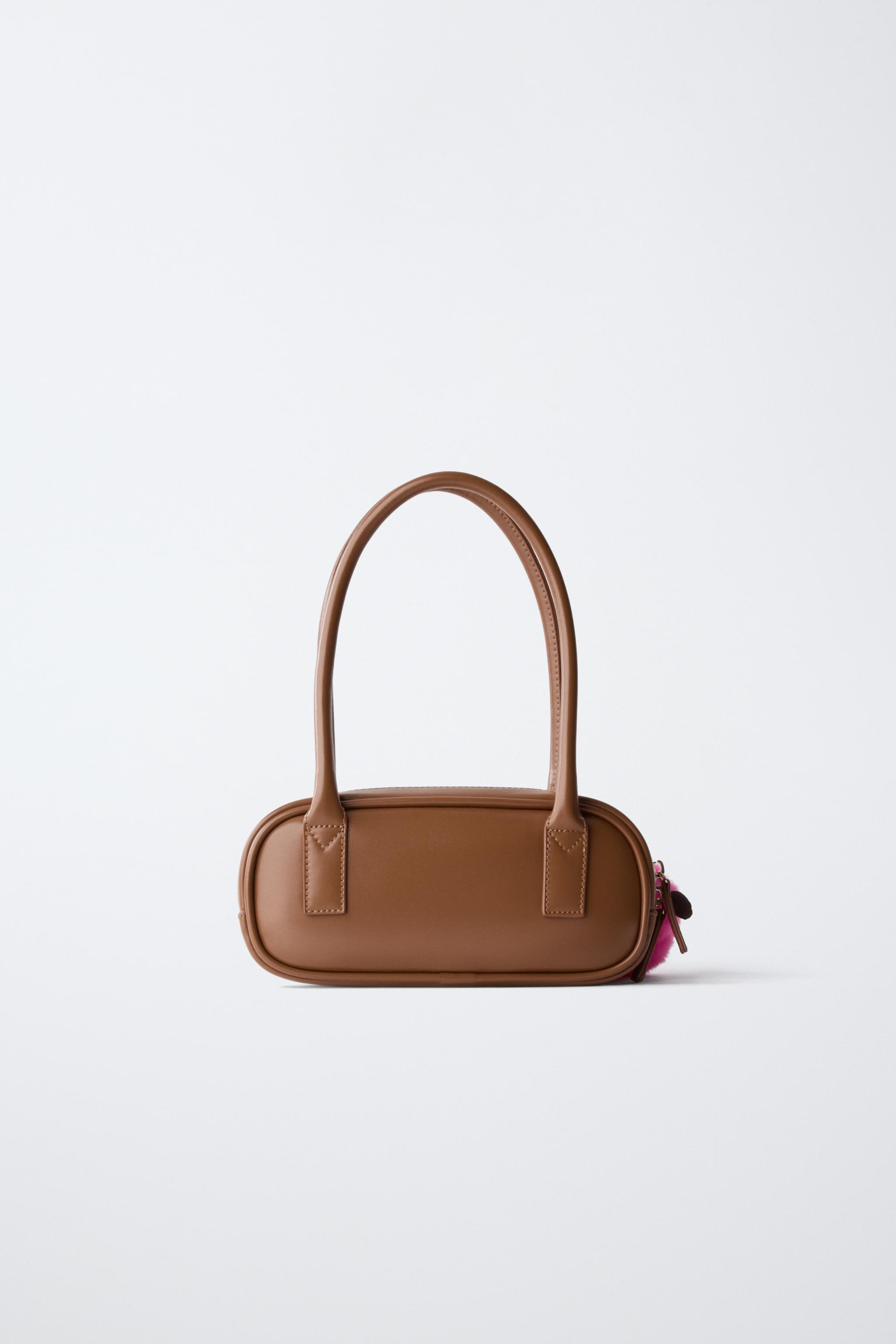 SAC À ÉPAULE POMPONS